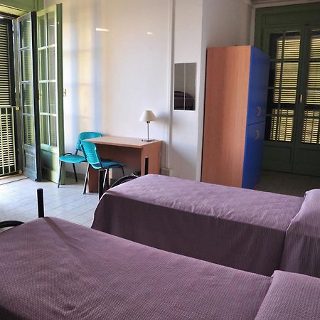 Litus Roma Hostel Lido di Ostia Exteriör bild A typical bedroom in a residence hall