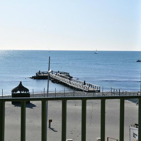 Litus Roma Hostel Lido di Ostia Exteriör bild The pier at the end of the promenade